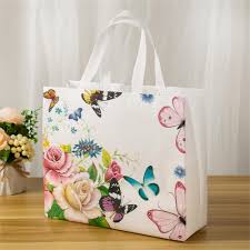 2pcs Floral and Butterfly Print Tote Bag Set with Matching Wallet, Magnetic Snap Closure, Durable Canvas Material, Foldable Design for Shopping and Travel - Includes Care Instructions